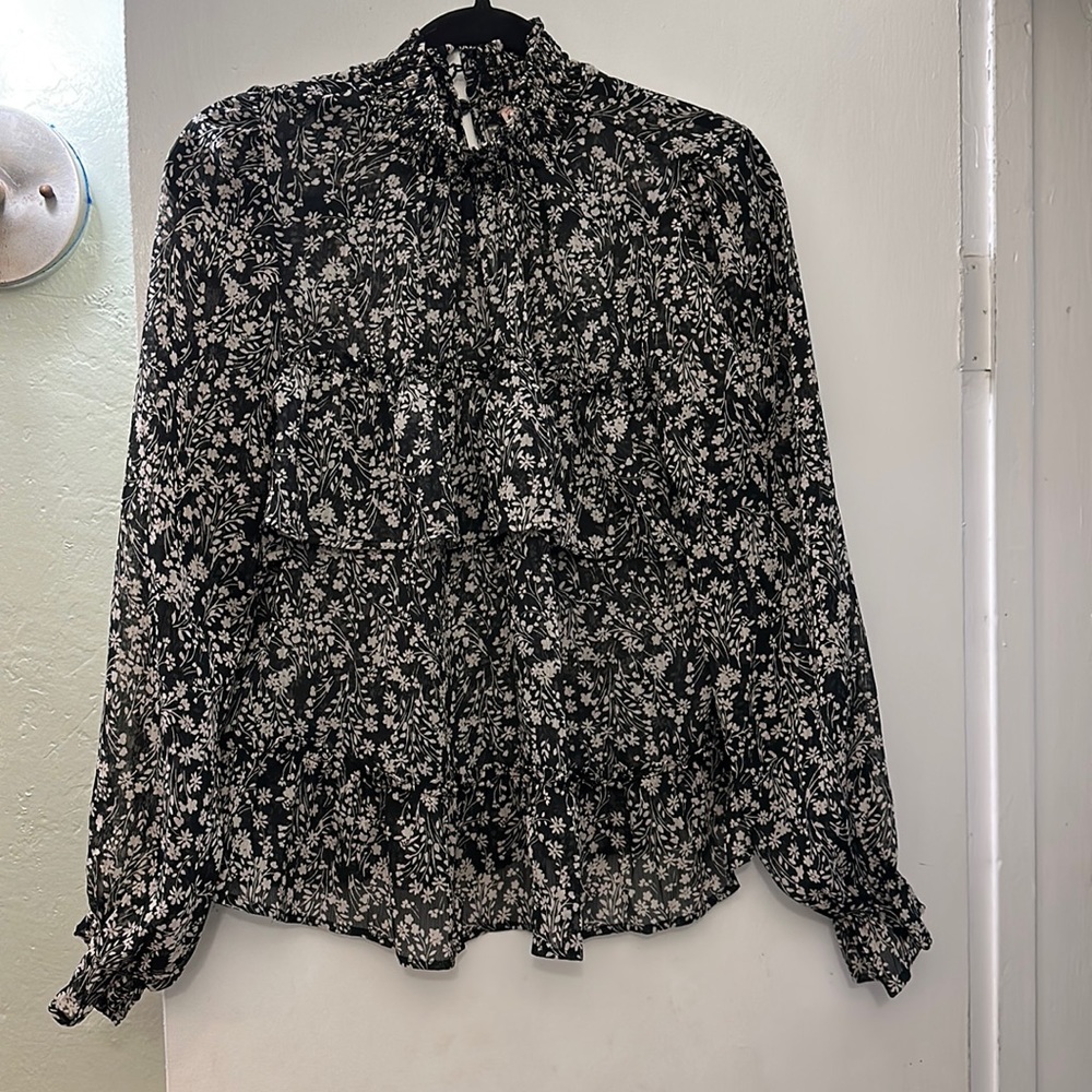 Black shirt with tan flowers